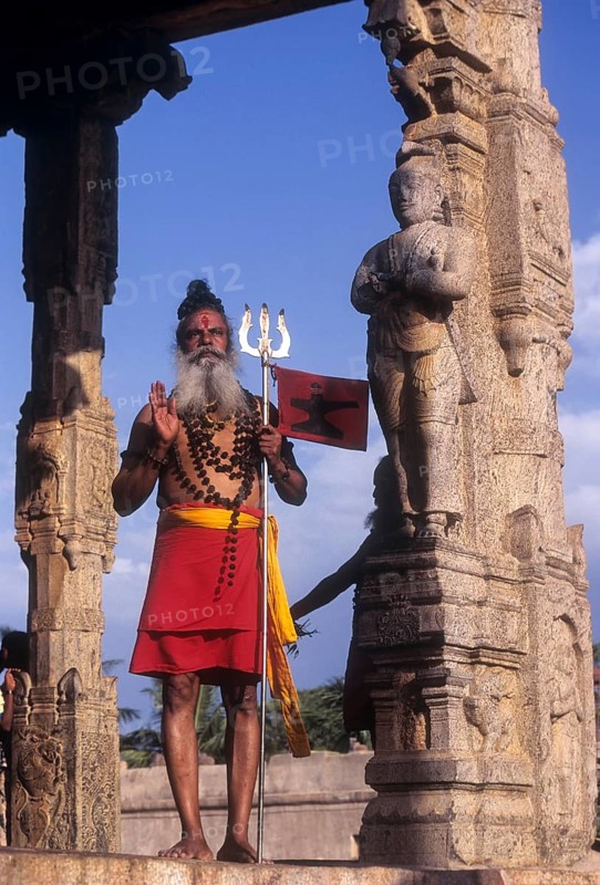 A Sadhu standing in Nandhi mandapam at Thanjavur Brihadeeswarar