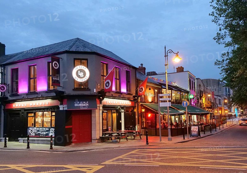 Irish pubs in evening light at Georges Quay