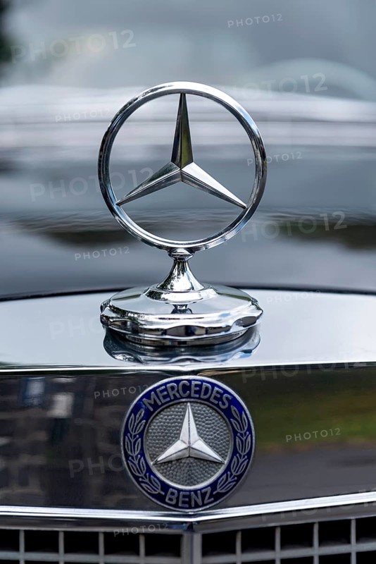 Radiator mascot Mercedes star with logo on classic car Mercedes-Benz 300 SEL Automatic