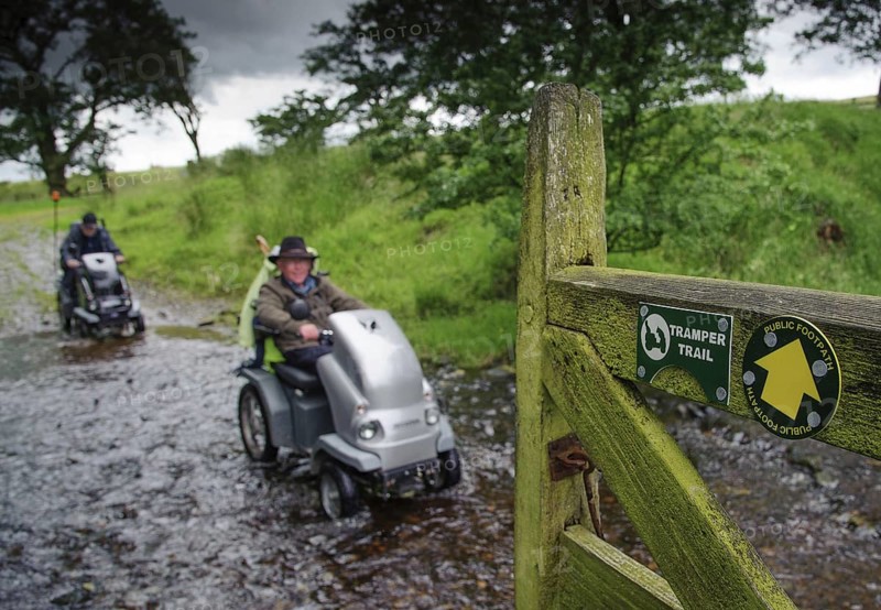 Signs for Tramper Trail and public footpath at gate