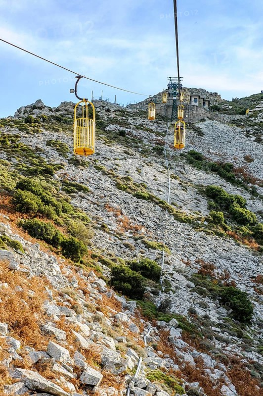 Ropeway Cabinovia Monte Capanne with open gondola Ropeway gondola standing gondola on mountain Monte Capanne