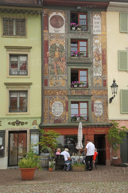 Street pub with mural on Muensterplatz in Bad Saeckingen