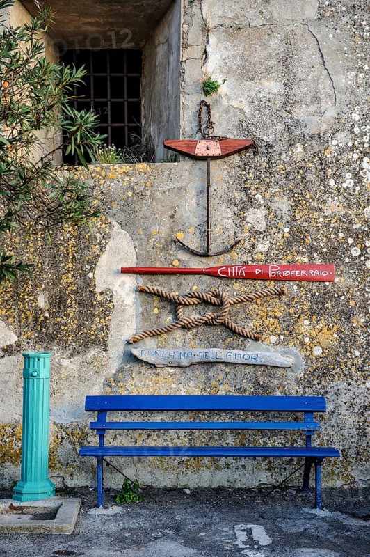 Wall decoration of nautical symbols on old house wall
