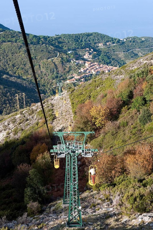 Cable car Cabinovia Monte Capanne with open standing gondola on Monte Capanne mountain