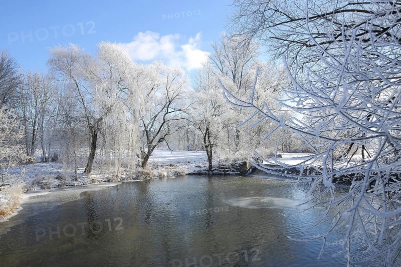Winter landscape on the Jagst with hoarfrost and snow