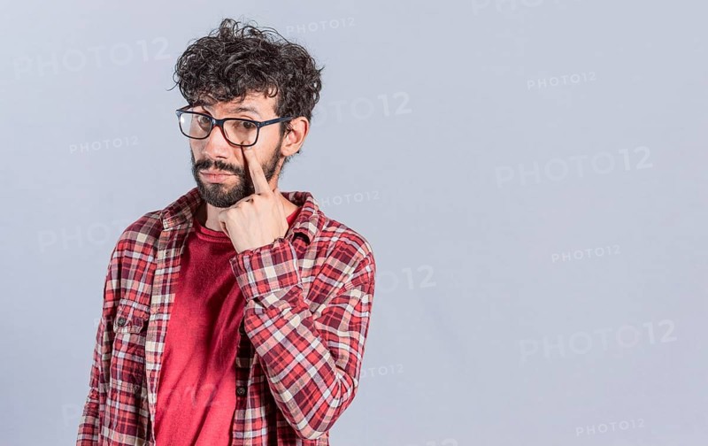 Distrustful person watching you