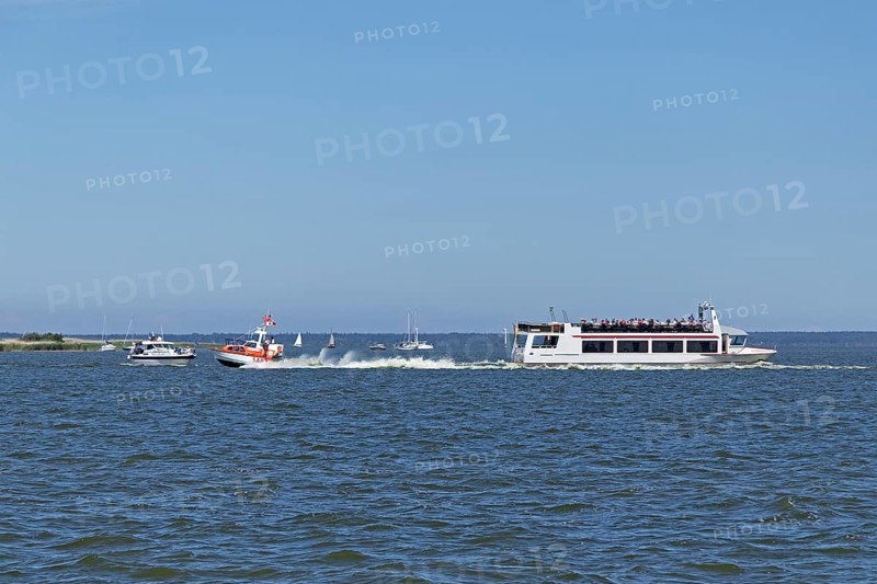 Excursion boat and other boats