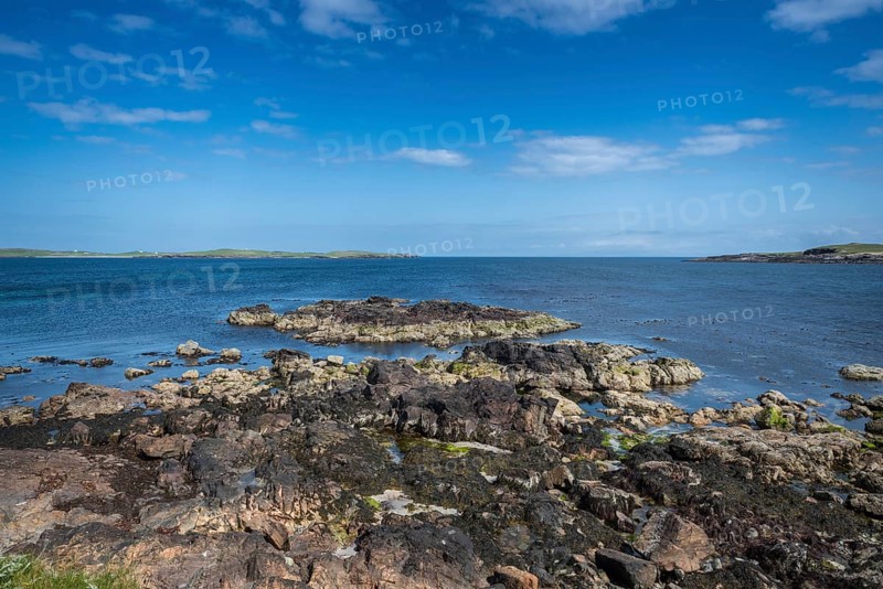 Coastal scene with view of the island of Papa Stour