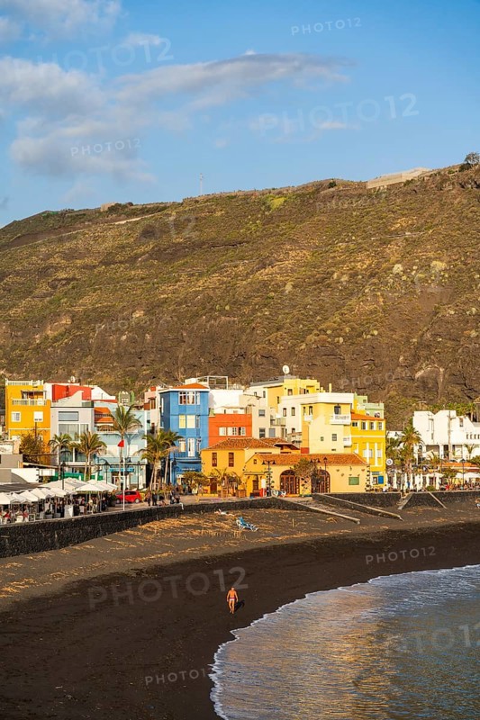 Lava beach and colourful houses in Puerto de Tazacorte