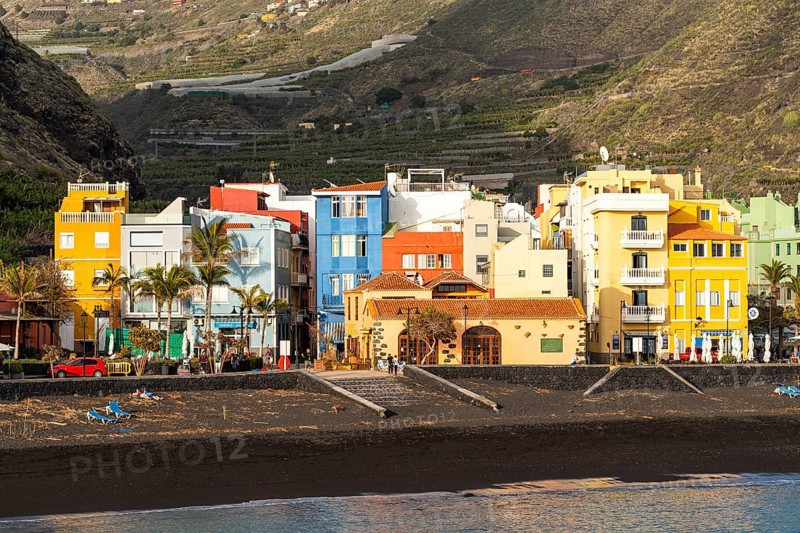 Lava beach and colourful houses in Puerto de Tazacorte