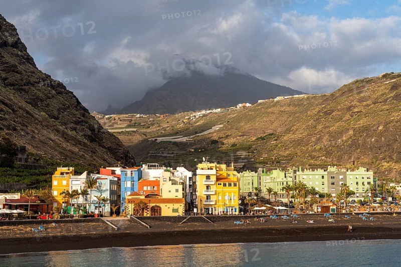 Lava beach and colourful houses in Puerto de Tazacorte