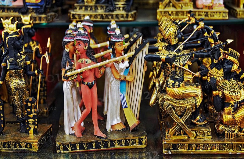 Figures of female musicians and archers as tourist kitsch at Hurghada airport