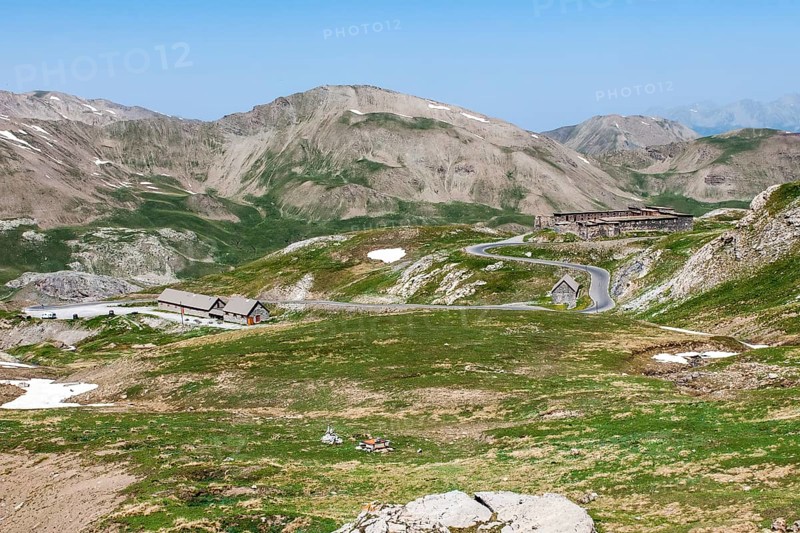View of alpine high plateau with historic Fortin Fort Garrison Caserne de Restefond on the right