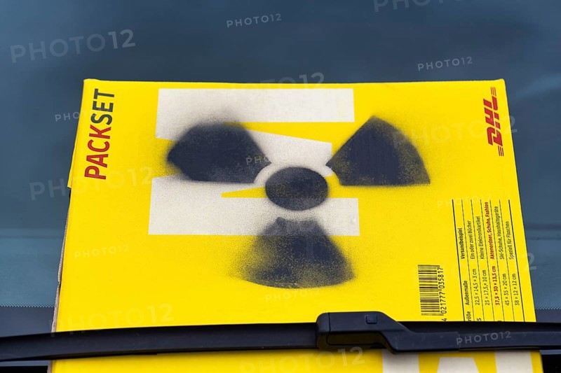 Sign for radioactivity on yellow package