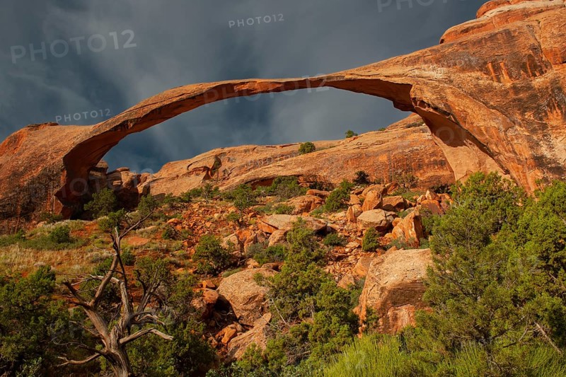 Landscape Arch at sunrise and approaching thunderstorm