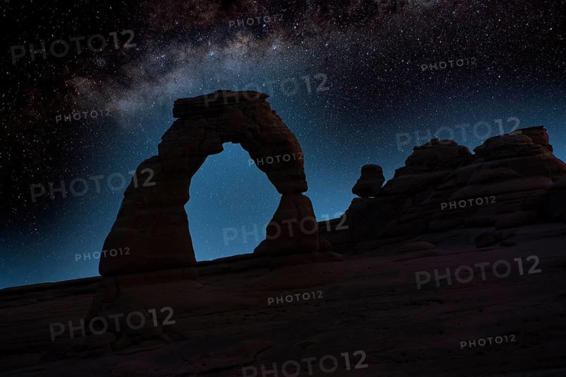 Delicate Arch rock at night with Milky Way