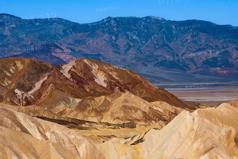 Coloured rock formations in the evening light at Zabriskie Point