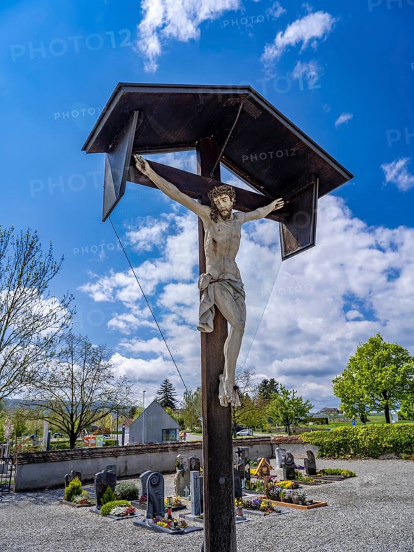 Crucifix in the cemetery of the Catholic parish church of St. George