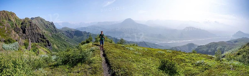 Hikers on trail at the ridge of Tindfjoell