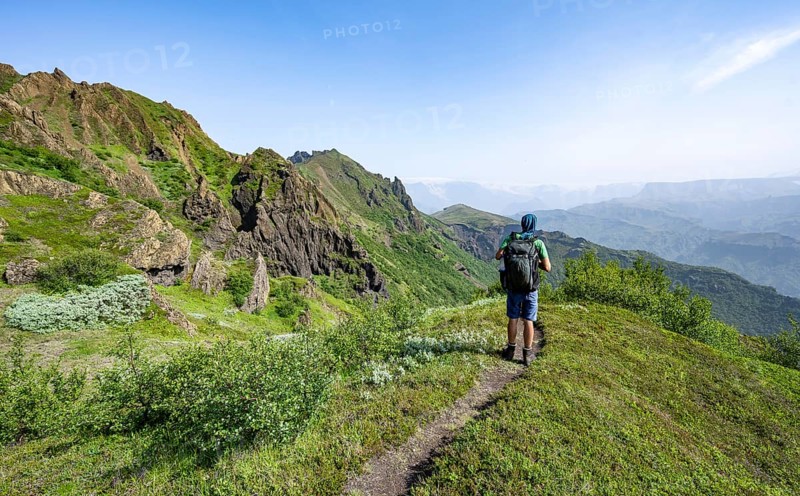 Hikers on trail on Tindfjoell ridge