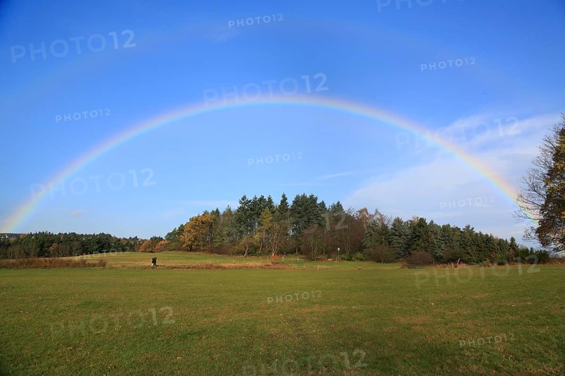 Rainbow over field and woodland near Eschweiler