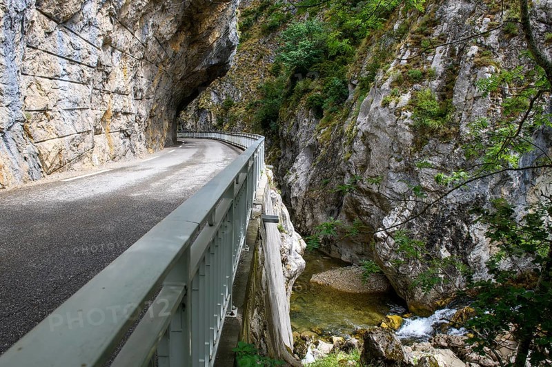 Narrow road through narrow gorge Clue de St. -Auban with overhanging rock