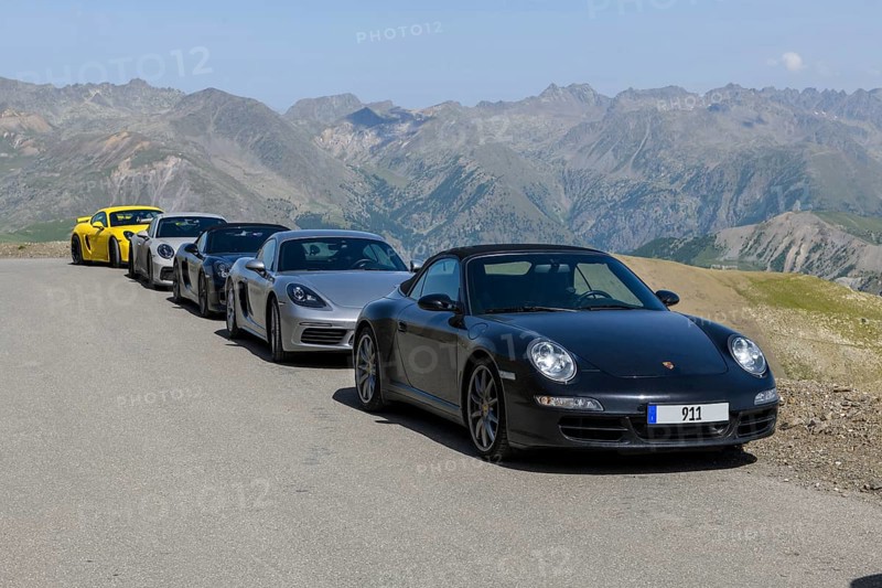Five Porsche sports cars on 2802 metre highest paved road in Alps