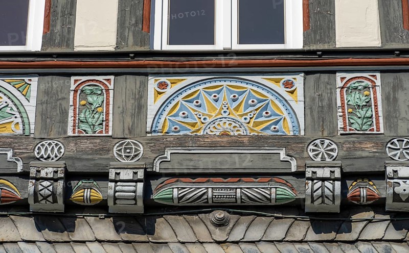 Half-timbered house decorated with carvings in the old town