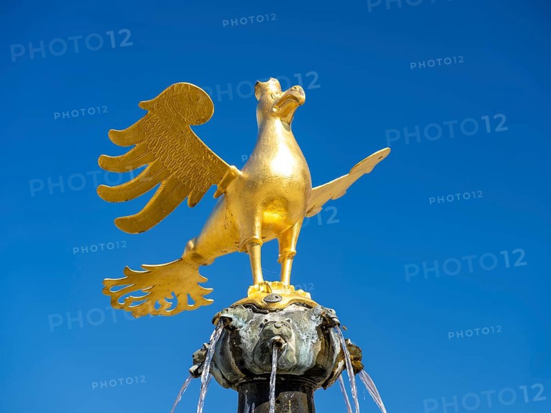 Golden eagle on the market fountain on the market square