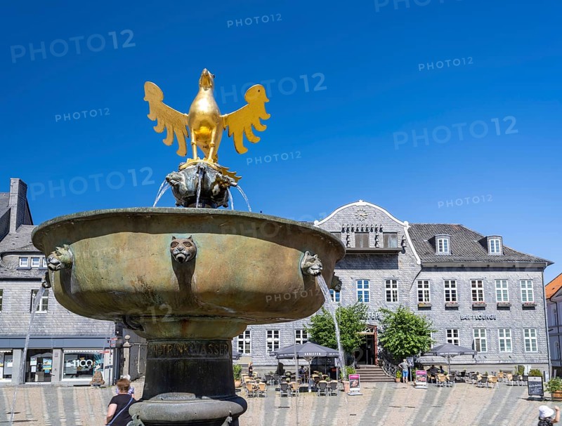 Golden eagle on the market fountain in front of the Kaiserringhaus on the market square