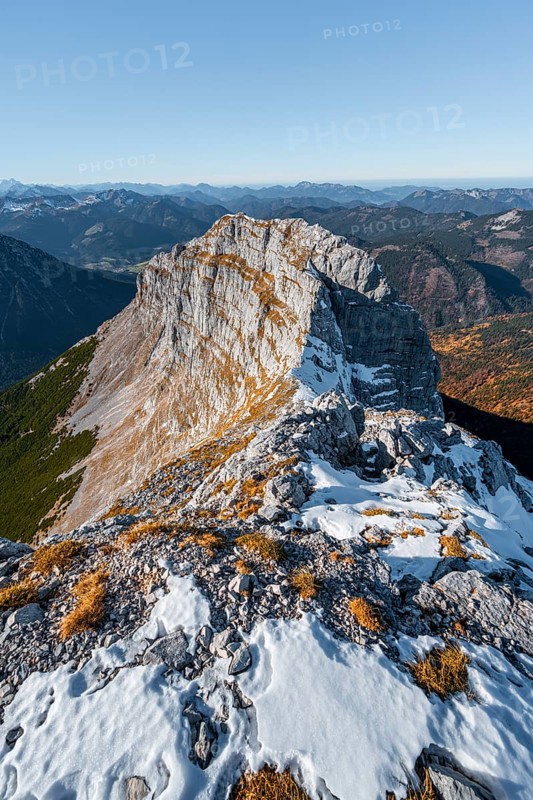 Summit ridge with first snow in autumn