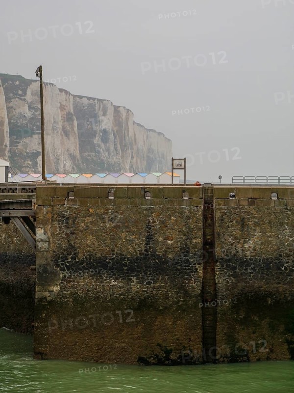Coastal village of Le Treport at the mouth of the Bresle on the English Channel with the highest chalk cliff in Europe