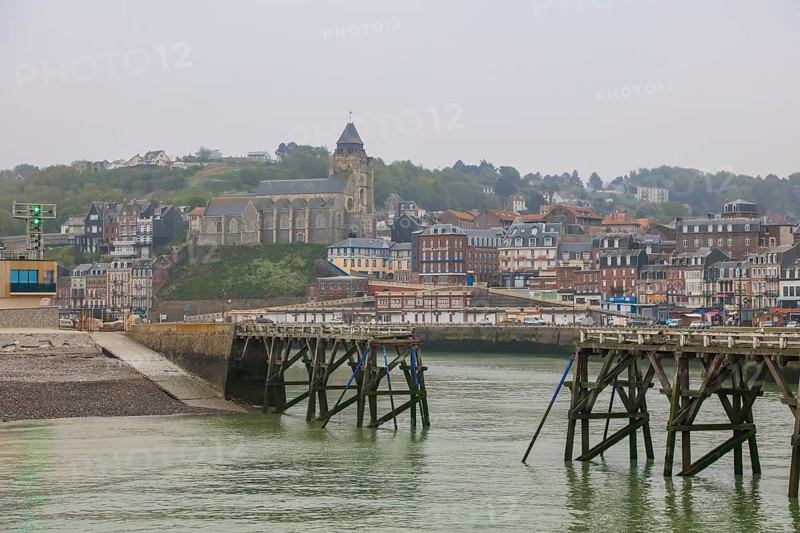 Coastal village of Le Treport at the mouth of the Bresle on the English Channel with Saint-Jacques church