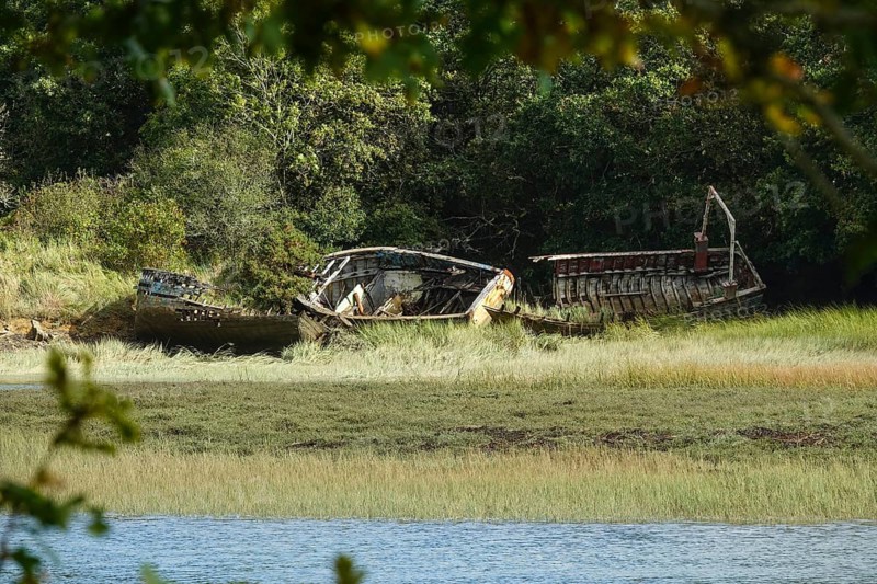 Wrecks of former fishing boats at the Anse du Moulin Neuf inlet