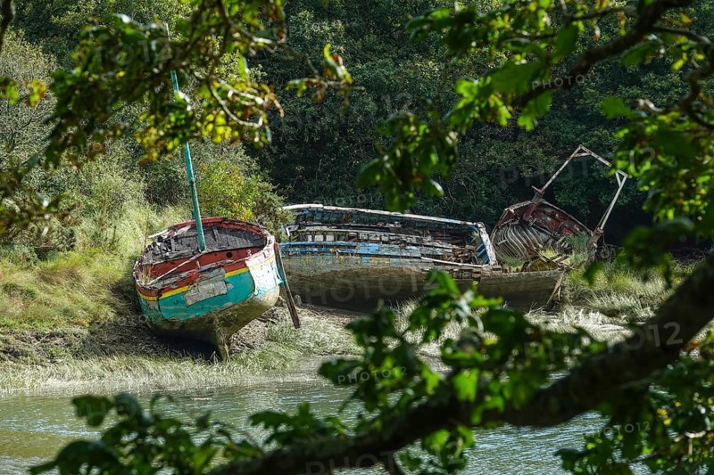 Wrecks of former fishing boats at the Anse du Moulin Neuf inlet