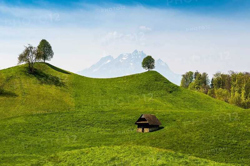 Panorama with huts and hills