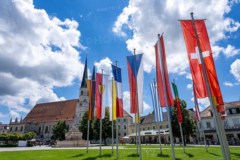 Bunting in front of the collegiate parish church of St Phillipus and Jakobus on Kapellplatz