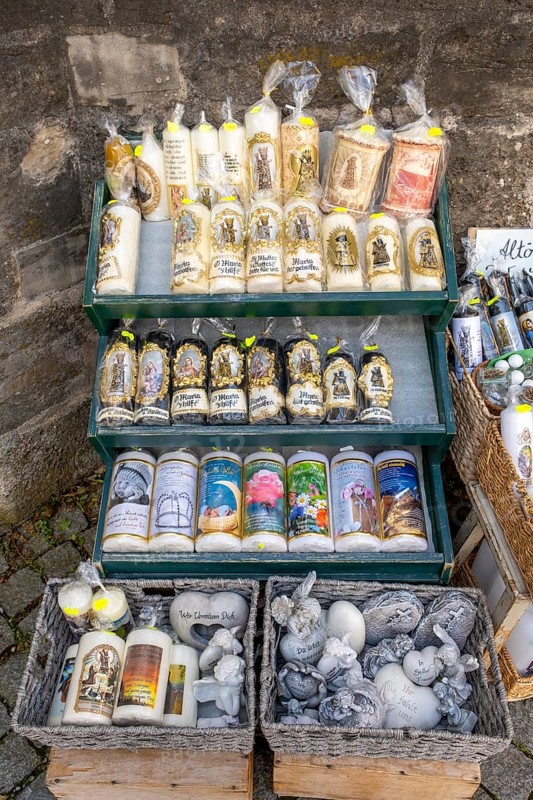 Candles in front of a devotional shop at Kapellplatz
