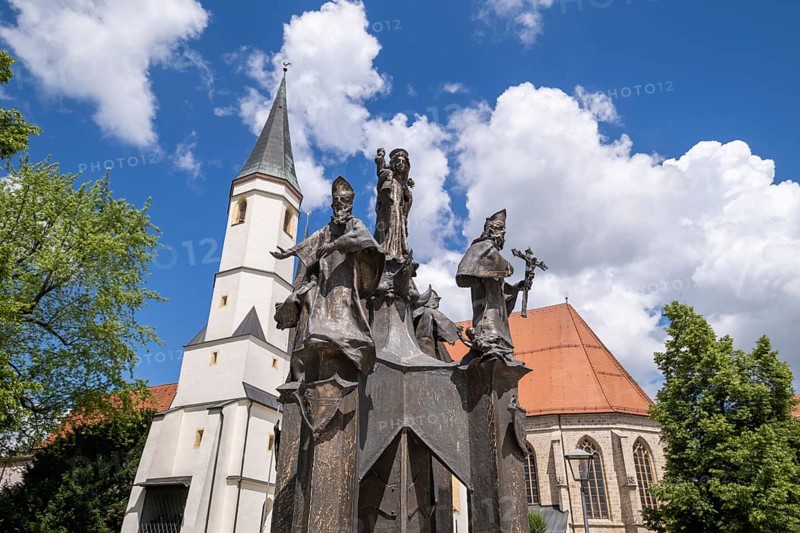 Fountain in front of the collegiate parish church of St. Philip and St. James in the pilgrimage town of Altoetting. The fountain was erected to mark the 1250th anniversary of the establishment of the four dioceses of Regensburg