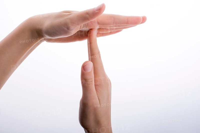 Break time hand gesture on a white background