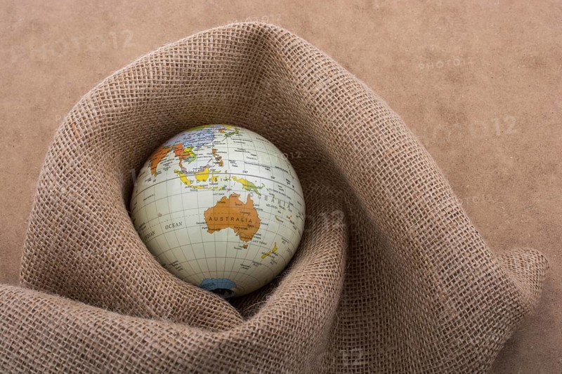 Linen canvas is wrapped around a model globe