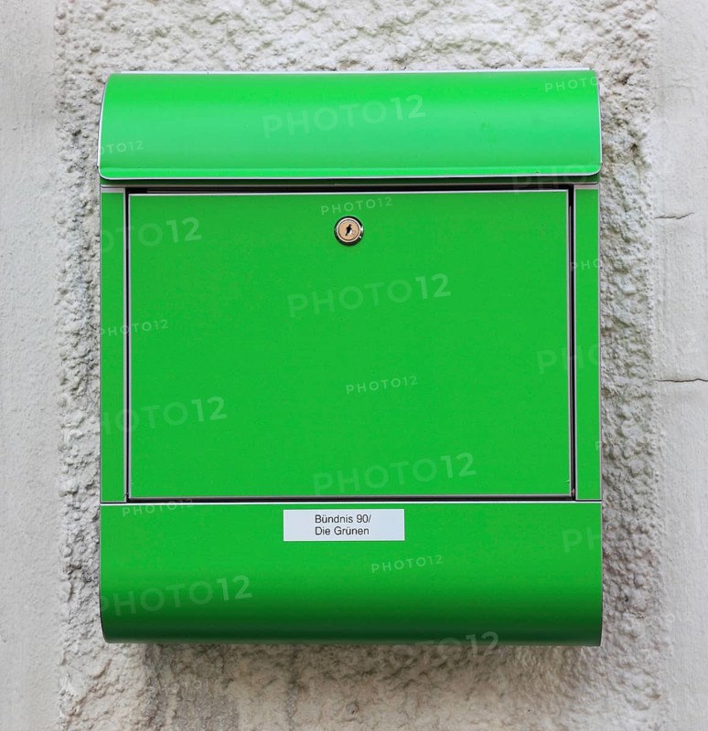 Green mailbox at an office of the Buendnis 90 Die Gruenen party