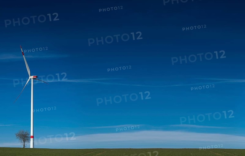 A windmill in the field with copy space