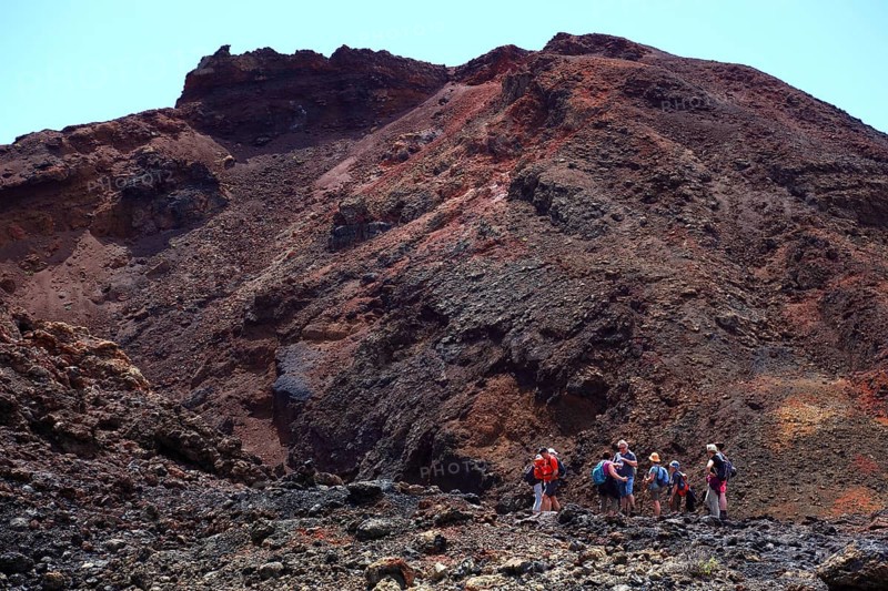 Hiking group in front of the volcano Teneguia at Cap Fuencaliente