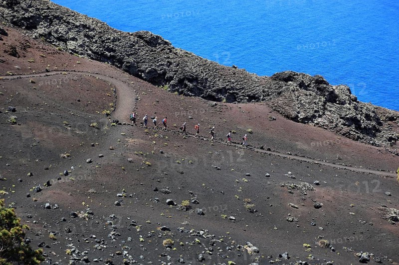 Hikers on the way from San Antonio Volcano to Teneguia Volcano at Cap Fuencaliente