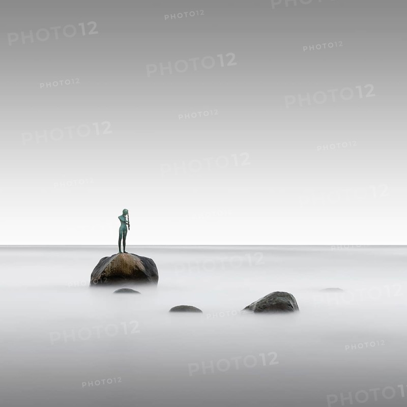 Long exposure of the statue Kaysa on the Baltic Sea beach of Ruegen