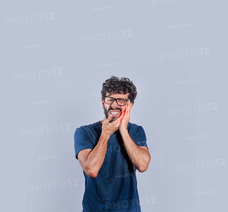 Person with pulpitis or toothache problem, Concept of people rubbing cheek with toothache