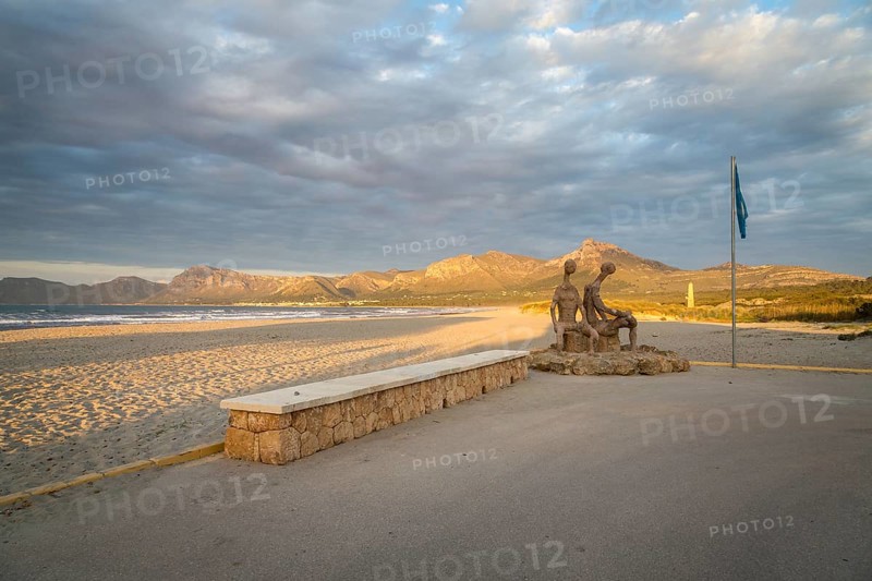 Beach promenade with sandy beach Playa Sa Canova in Son Serra de Marina, sculptures by Joan Bennassar