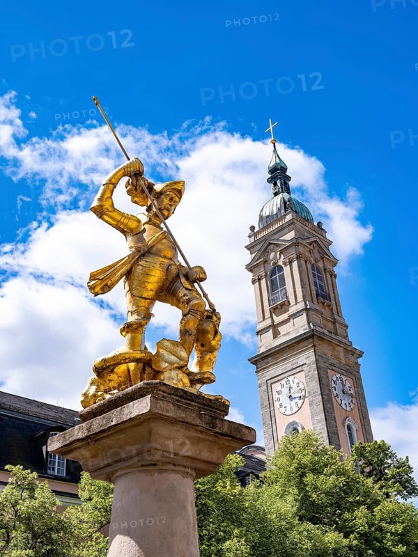 Sculpture of St. George with gilded armour as dragon slayer at St. George's Fountain in front of the Georgenkirche, Eisenach