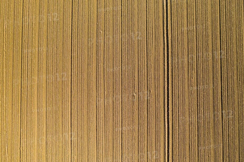 Aerial view of plowed agricultural field ready for planting,